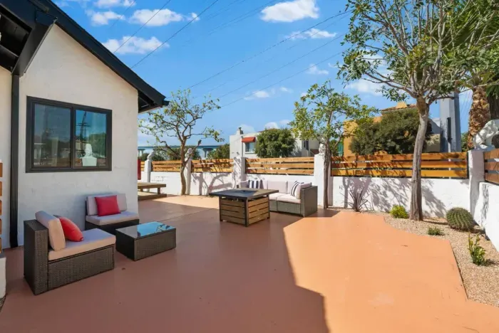 A stylish and spacious patio perfect for relaxation and outdoor gatherings.