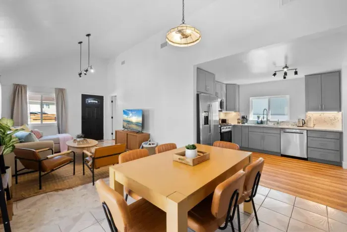 Bright and modern open-concept kitchen, dining, and living space!