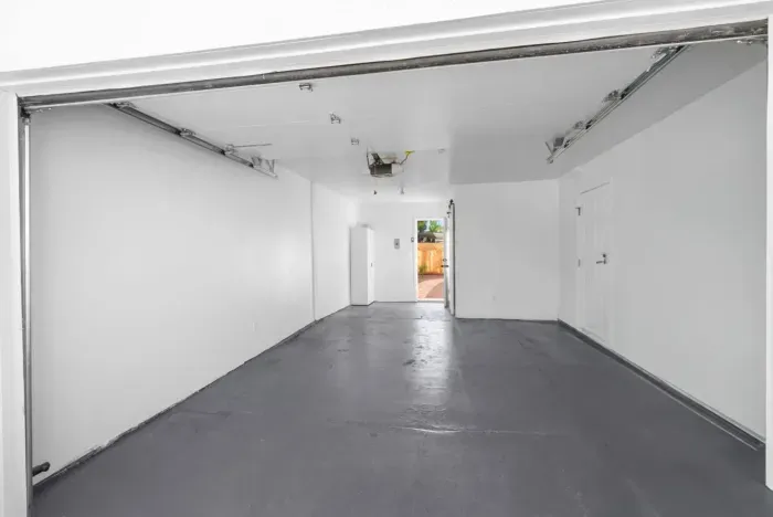 The garage can fit a small vehicle