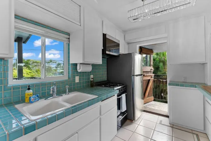 Fully equipped kitchen with natural light.
