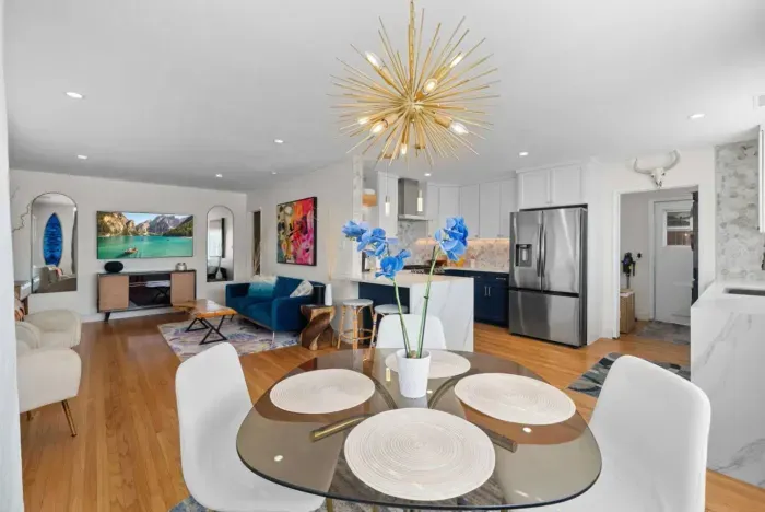 Open-concept living with modern decor and vibrant accents.