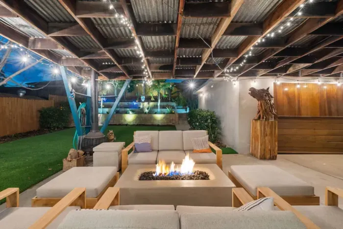 Cozy up under the lights with firepit vibes and stylish comfort!