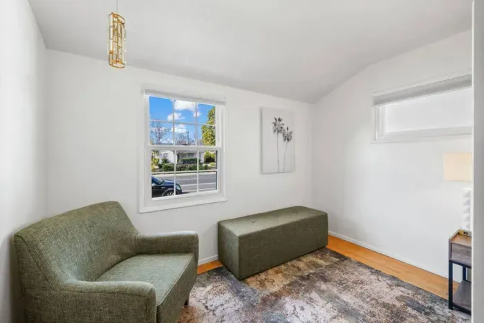 Bright and cozy reading nook with a stylish touch.