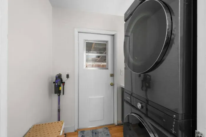 Stylish laundry space with modern appliances for your convenience!