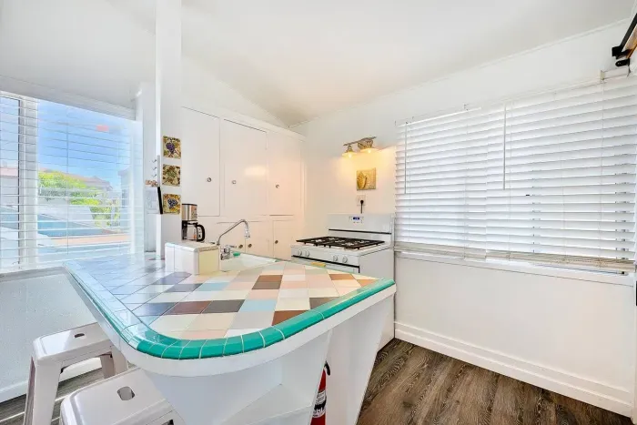 A retro-tiled kitchen ready for beachside breakfasts.