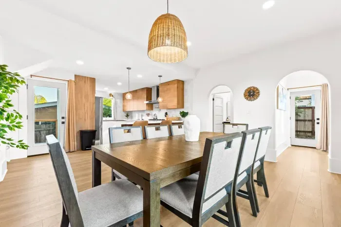 Open dining and kitchen space with modern finishes.