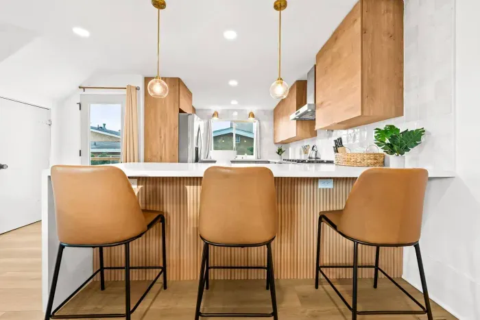 Cozy bar seating along the kitchen counter.