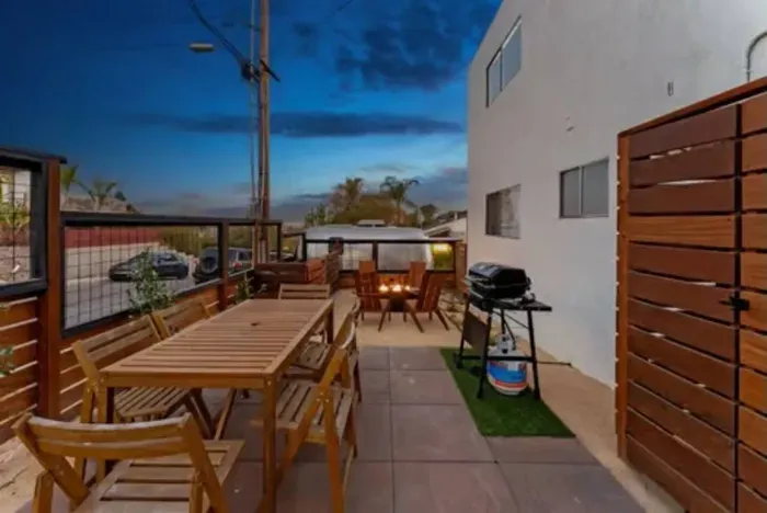 Unwind with al fresco dining and a cozy shared BBQ area.