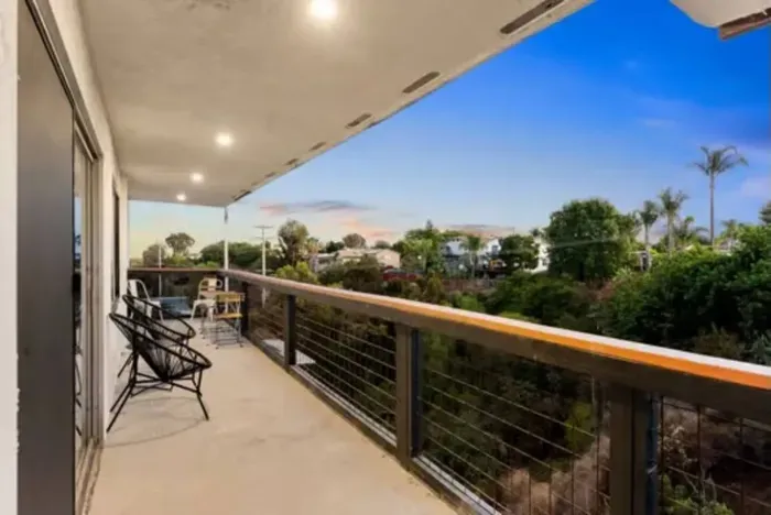 Take in stunning sunset views from your balcony perch.