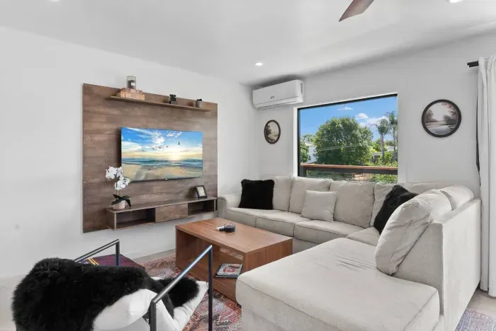 Relax in a bright modern living space with sweeping canyon views.