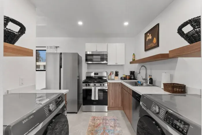 Cook with ease in a fully equipped, sleek modern kitchen.