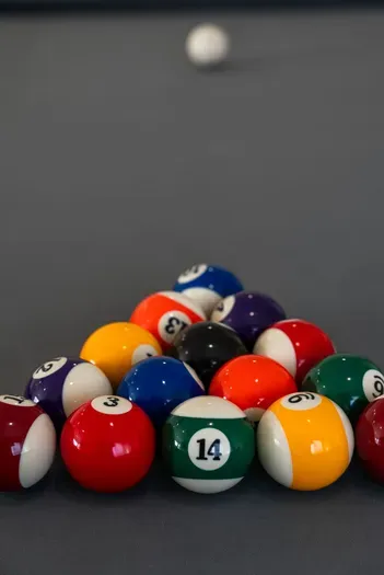 Sleek gray-felt pool table—game room fun for evenings and rainy days.