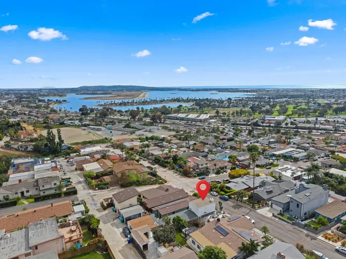 Coastal home near bay—walk to water, parks, and recreation.