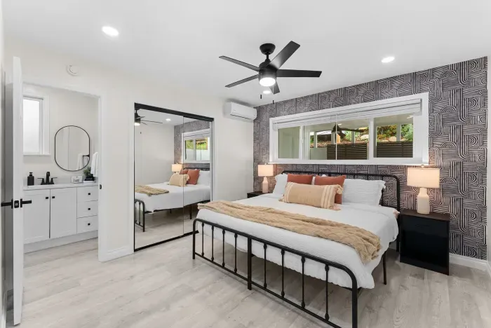 Chic king suite with AC, ensuite bath, and mirrored closet doors