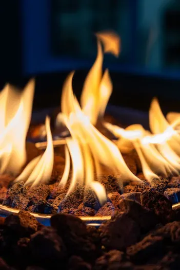 Cozy gas fire pit with lava rocks—perfect for starlit nights