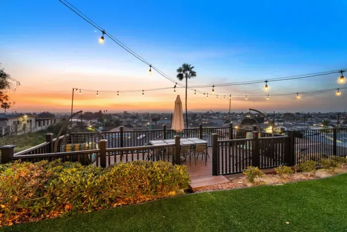 Unwind on a charming deck with panoramic sunset views!