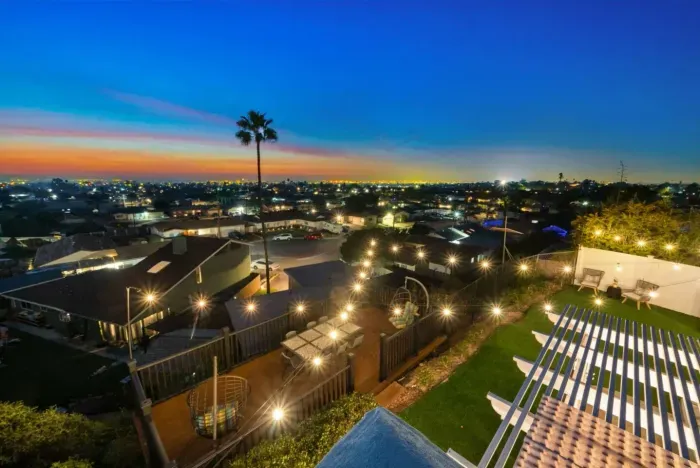 Experience magical evenings with stunning city views and cozy outdoor lighting!