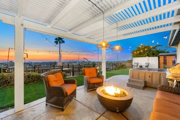 Unwind with breathtaking sunset views, a cozy fire pit, and a relaxing hot tub.