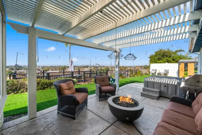 Relax in the backyard with a hot tub!