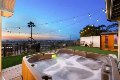 Soak in the hot tub and enjoy the beautiful views