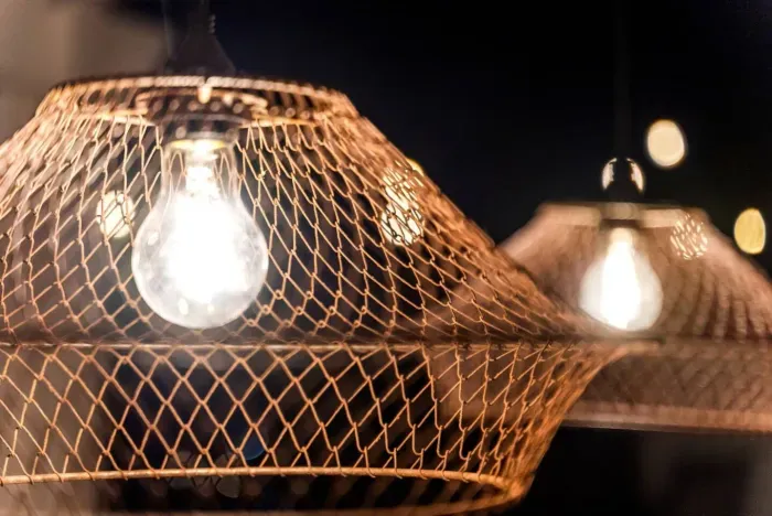 Elegant woven pendant lights add a warm and cozy ambiance to your stay.