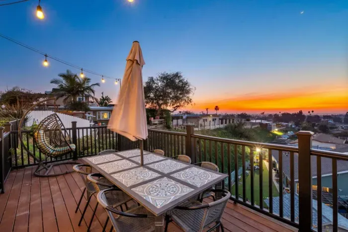 Relax on a stunning deck with sunset views and cozy ambiance