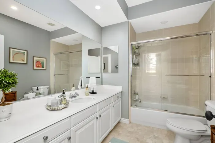 Bathroom 2 is a Jack and Jill bathroom shared between Bedrooms 2 and 3