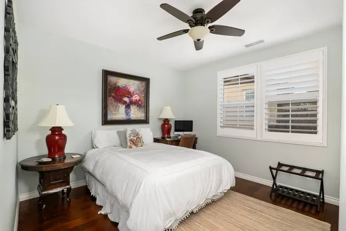 Bedroom 4 features a queen bed and is located just off of the upstairs living room