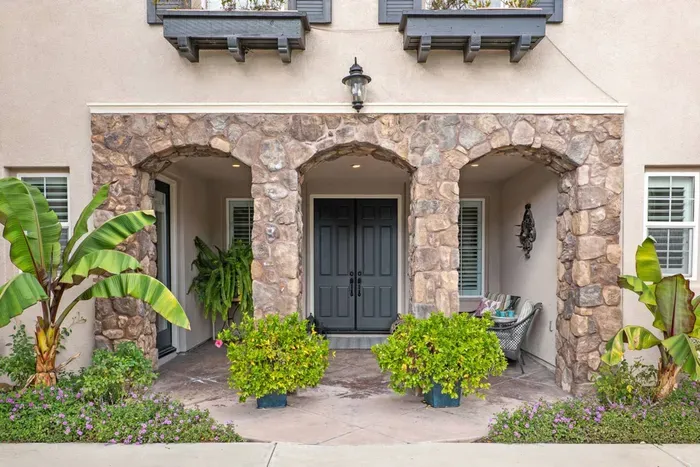 A beautiful stone arched entrance greets you upon arrival