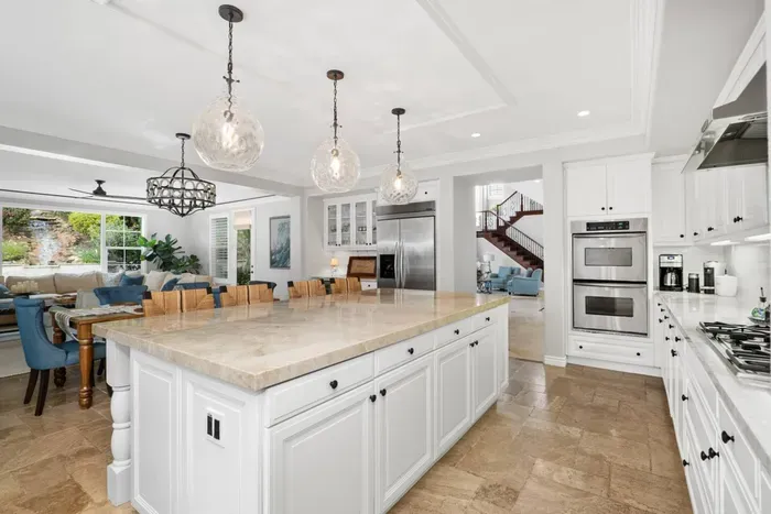 The kitchen features a regular drip coffee pot, as well as a Nespresso