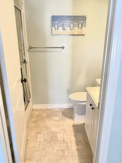 Bathroom 5 is ensuite of Bedroom 5 and is a full bathroom with a sink, toilet and shower/tub combo