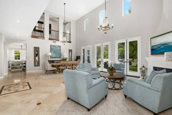 Entryway and formal living that is open to the second floor
