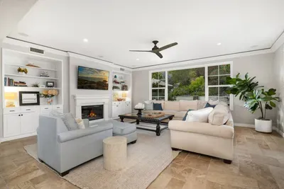 Gather with your crew in the living area attached to the kitchen and dining