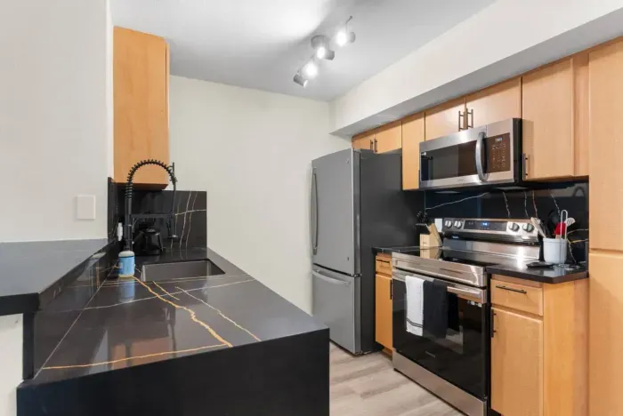 Modern kitchen with essential amenities.