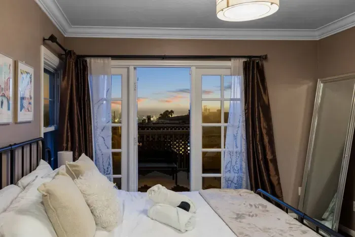 French doors leading to a private balcony with ocean breezes