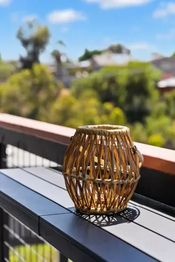 Serene balcony nook with warm natural touches.