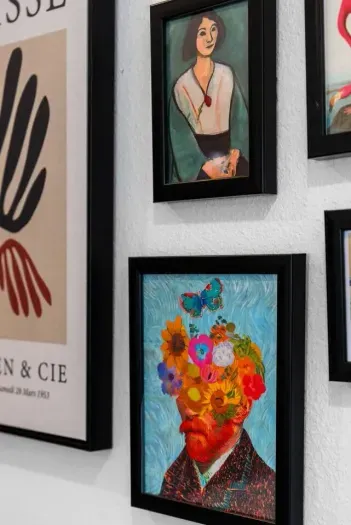 Curated art collection adds vibrancy and style throughout.