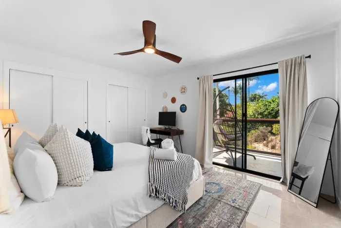 Bedroom with a queen bed and cozy design.