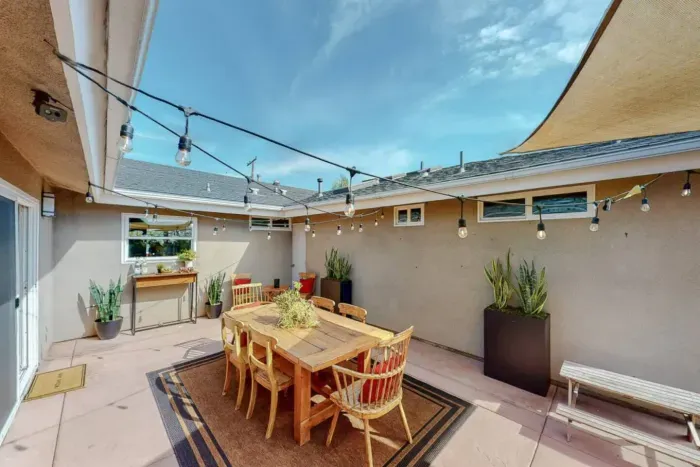 Outdoor dining table in the backyard for alfresco meals.