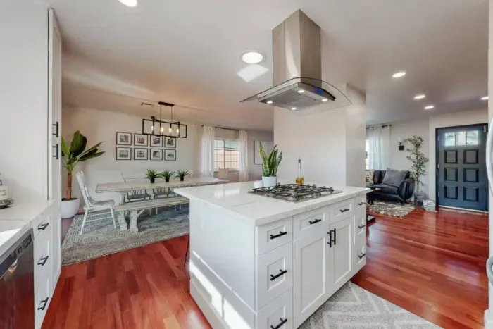 Accessible kitchen, living room, and dining area for seamless living and entertaining.