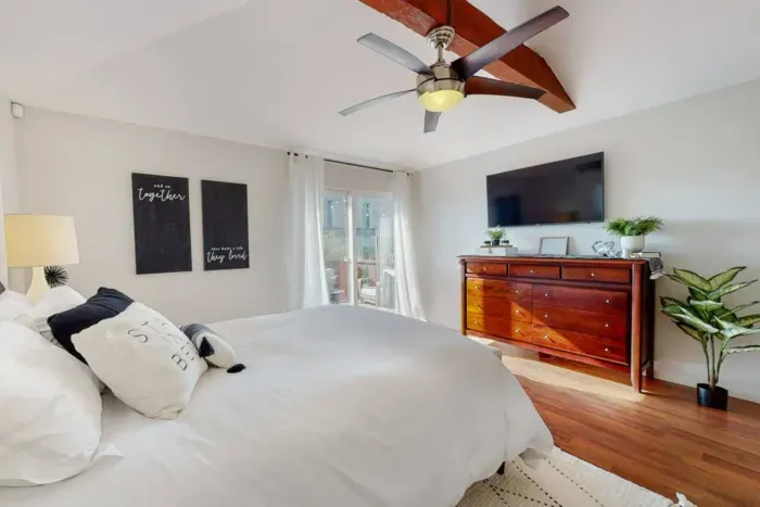 Relaxing in bed while watching TV for ultimate comfort.