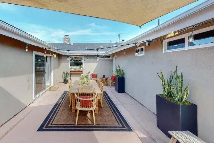 Convenient access to alfresco dining in the backyard for enjoyable meals outdoors.