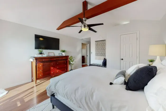 Relax on a soft bed with plush pillows for ultimate comfort.