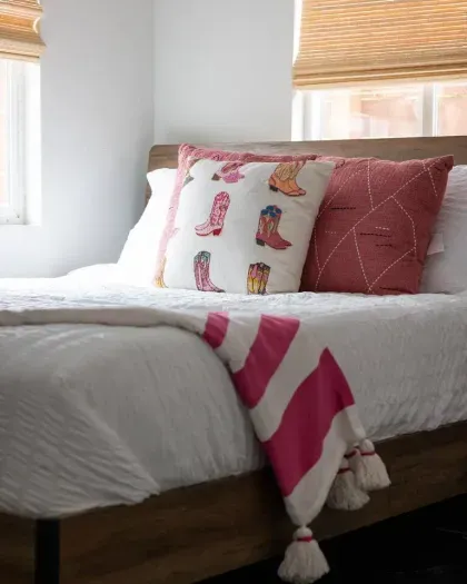Wake up refreshed in this cozy bedroom with soft linens designed for restful sleep.