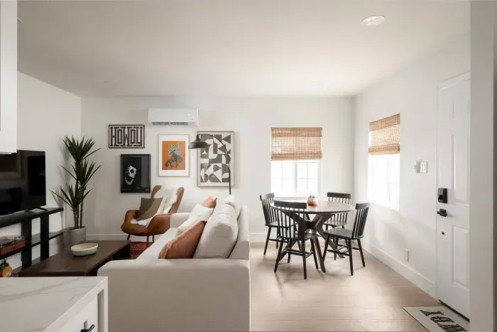 Enjoy the open-concept layout where the living and dining spaces flow seamlessly, perfect for gathering and sharing meals.