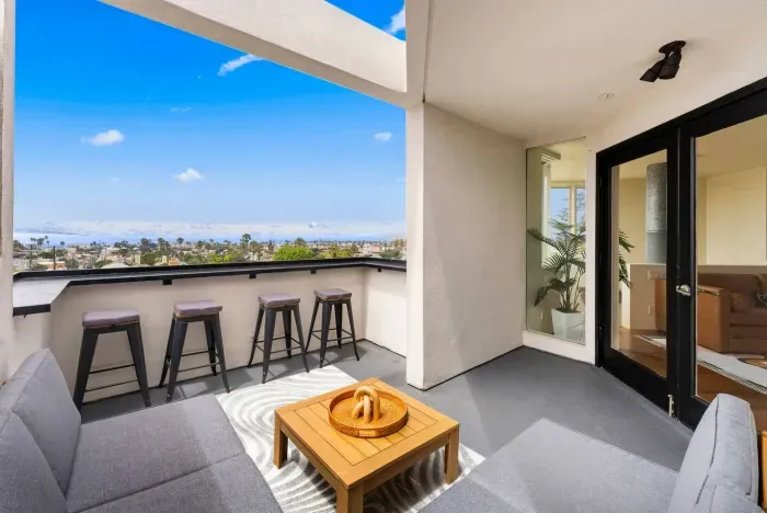 Private balcony with seating for morning coffee
