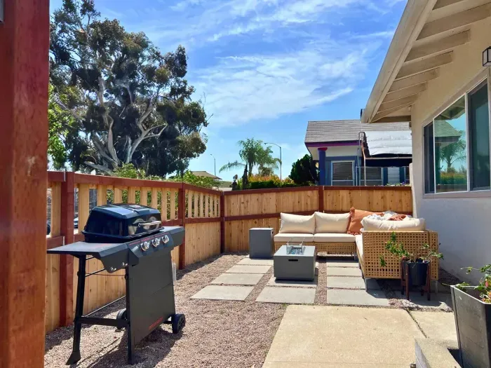 Front patio with BBQ grill, outdoor seating and fire pit 