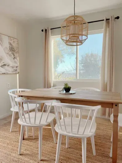 Chic and welcoming dining area perfect for enjoying meals and gathering with friends.