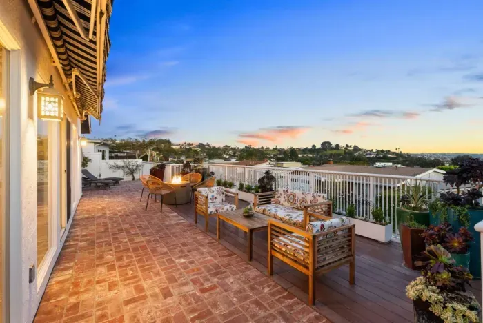 Unwind by the fire and soak in this stunning sunset view!