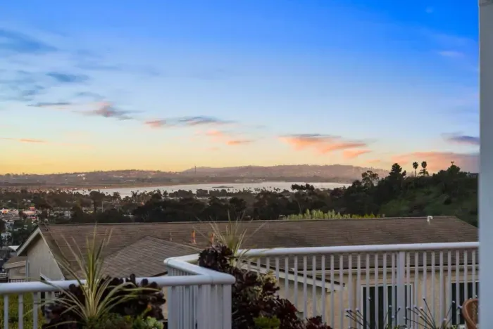 Enjoy stunning bay and city skyline views from your private deck!